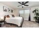 Serene bedroom with a plush bed, ample natural light, and artistic decor, perfect for relaxation and style at 9274 Dunwich Dr, Gastonia, NC 28056