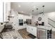 Modern kitchen with stainless steel appliances, granite countertops, an island and hardwood floors at 9274 Dunwich Dr, Gastonia, NC 28056