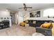 Spacious living room with a large gray sectional couch and unique movie-themed decor at 9274 Dunwich Dr, Gastonia, NC 28056