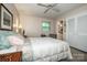 Tranquil bedroom featuring hardwood floors, a large bed, and natural light from the window at 928 Tally Ho Ct, Charlotte, NC 28212