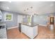 Kitchen island with stainless steel sink and dishwasher at 952 Salisbury St, Wadesboro, NC 28170