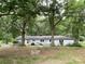 Backyard of home with a fire pit and patio area at 103 Boyd Dr, Stanley, NC 28164