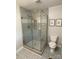 Modern bathroom with glass shower and patterned tile at 103 Boyd Dr, Stanley, NC 28164