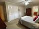 Cozy main bedroom with a queen bed and ample closet space at 103 Boyd Dr, Stanley, NC 28164