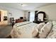 Well-lit bedroom featuring a comfortable bed, dresser, and natural light at 1031 Daniel Dr, Stanley, NC 28164