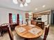 Kitchen and dining area, perfect for Gathering meals and entertaining with natural light at 1031 Daniel Dr, Stanley, NC 28164