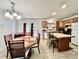 Charming kitchen with an island, adjacent to a dining area with a view to the outdoors at 1031 Daniel Dr, Stanley, NC 28164