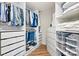 Organized walk-in closet with custom shelving and drawers, maximizing storage space at 1038 Southwest Dr, Davidson, NC 28036