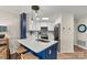 Modern kitchen with stainless steel appliances, marble countertops, and stylish pendant lighting at 1038 Southwest Dr, Davidson, NC 28036