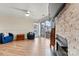 Living room view showcases a fireplace, comfortable seating, and sliding glass doors to a patio at 1038 Southwest Dr, Davidson, NC 28036