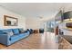 Bright living room boasts comfortable seating, fireplace, TV, and sliding glass doors to the outdoor patio at 1038 Southwest Dr, Davidson, NC 28036