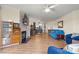 Spacious living room with fireplace, TV, elegant furnishings, and an open layout to the kitchen at 1038 Southwest Dr, Davidson, NC 28036