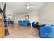 Living room is spacious, showing access to kitchen, hallway, and fireplace at 1038 Southwest Dr, Davidson, NC 28036