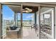 Outdoor patio with comfortable seating, overlooking a lake, offering a relaxing space at 1038 Southwest Dr, Davidson, NC 28036