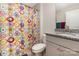 Charming bathroom featuring granite counters, colorful accents, and cheerful atmosphere at 1054 Thoroughbred Dr, Iron Station, NC 28080