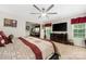 A well-lit bedroom showcases a comfortable bed and furniture at 1054 Thoroughbred Dr, Iron Station, NC 28080
