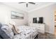 Comfortable bedroom features a large dresser and decoratively themed paintings at 1054 Thoroughbred Dr, Iron Station, NC 28080
