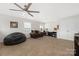 Spacious bedroom featuring a large beanbag, sitting area, and dual workstation setup at 1054 Thoroughbred Dr, Iron Station, NC 28080