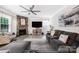 Inviting living room featuring a stone fireplace and comfortable seating area at 1054 Thoroughbred Dr, Iron Station, NC 28080