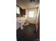 This bathroom features a pedestal sink, medicine cabinet, and a window for natural light at 1073 Springdale Dr, Maiden, NC 28650