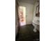 A bathroom showcasing a pedestal sink and view into other rooms at 1073 Springdale Dr, Maiden, NC 28650
