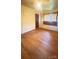 Bedroom with hardwood floors, wallpaper, and natural light at 1073 Springdale Dr, Maiden, NC 28650