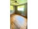 Bedroom with ceiling fan, hardwood floors, and wallpaper at 1073 Springdale Dr, Maiden, NC 28650