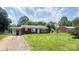 Charming single-story brick home with a carport and a spacious front yard at 1073 Springdale Dr, Maiden, NC 28650