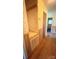 Hallway with wooden accents, hardwood floors, and wallpaper at 1073 Springdale Dr, Maiden, NC 28650