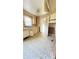 Kitchen with vintage cabinetry, ample countertop space, and patterned flooring at 1073 Springdale Dr, Maiden, NC 28650