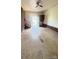 Living room with brick accents, staircase, and natural light at 1073 Springdale Dr, Maiden, NC 28650