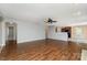Bright and airy living room with hardwood floors, and an open layout into the kitchen at 12829 Brandenburg Ln, Midland, NC 28107