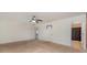 A carpeted main bedroom with ceiling fan and multiple doors at 12829 Brandenburg Ln, Midland, NC 28107