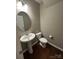 Convenient half bathroom with modern fixtures and clean design at 1349 Bridgeford Nw Dr, Huntersville, NC 28078