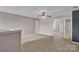 Bonus room featuring neutral walls, carpeted floors and multiple doorways at 1349 Bridgeford Nw Dr, Huntersville, NC 28078