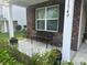 Charming front porch with a bench and tasteful decor, inviting guests to a cozy home at 1349 Bridgeford Nw Dr, Huntersville, NC 28078