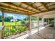 A view from the covered porch looking out onto the green lawn and landscaped back yard at 1532 Buffalo Shoals Rd, Claremont, NC 28610