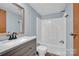 Bathroom features updated vanity with granite countertop, new fixtures and a tub-shower combo at 1532 Buffalo Shoals Rd, Claremont, NC 28610
