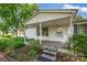 Close-up view of the front porch, highlighting the quaint details and inviting entrance of the home at 1532 Buffalo Shoals Rd, Claremont, NC 28610