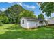 The detached garage features ample storage or workshop space and is set amongst the expansive yard at 1532 Buffalo Shoals Rd, Claremont, NC 28610