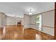 Open floor plan of the living room with hardwood floors and a fireplace at 1532 Buffalo Shoals Rd, Claremont, NC 28610