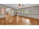 Open living room with gorgeous hardwood flooring and plenty of natural light at 1532 Buffalo Shoals Rd, Claremont, NC 28610
