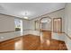 An open floor plan living room with hardwood floors and natural lighting at 1532 Buffalo Shoals Rd, Claremont, NC 28610