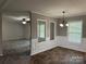 Dining room view leading to the Gathering room with large windows for natural light at 1555 Moore Rd, York, SC 29745