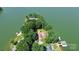 Aerial view of waterfront property with lush trees and private dock at 160 Quail Hollow Dr, Kings Mountain, NC 28086
