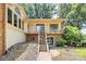 Two-story home with walkout basement and spacious deck overlooking a private backyard; perfect for outdoor entertaining at 160 Quail Hollow Dr, Kings Mountain, NC 28086