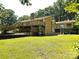 Lakeside house with multiple decks and a spacious yard providing ample space for outdoor activities at 160 Quail Hollow Dr, Kings Mountain, NC 28086