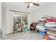 Bedroom showing lots of pillows and bedding, hardwood floors, and sliding glass doors at 160 Quail Hollow Dr, Kings Mountain, NC 28086