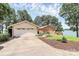 Inviting exterior with brick and siding, showcasing a spacious driveway at 160 Quail Hollow Dr, Kings Mountain, NC 28086