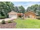 Well-maintained home with a brick and siding facade, an attached garage, a front lawn, and manicured shrubbery at 160 Quail Hollow Dr, Kings Mountain, NC 28086